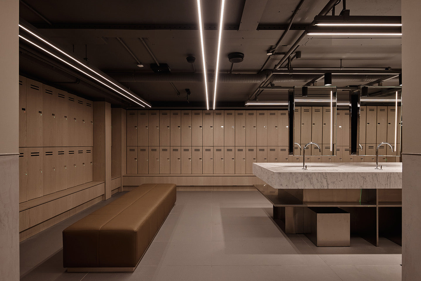 The cool, calm and highly finessed end-of-trip facility is beautifully detailed and supremely kitted out. Photography © Peter Bennetts c/o Hassell.
