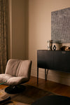 Featuring the Baxter Marilyn Revolving Armchair and Maxalto Alcor Storage Unit.
