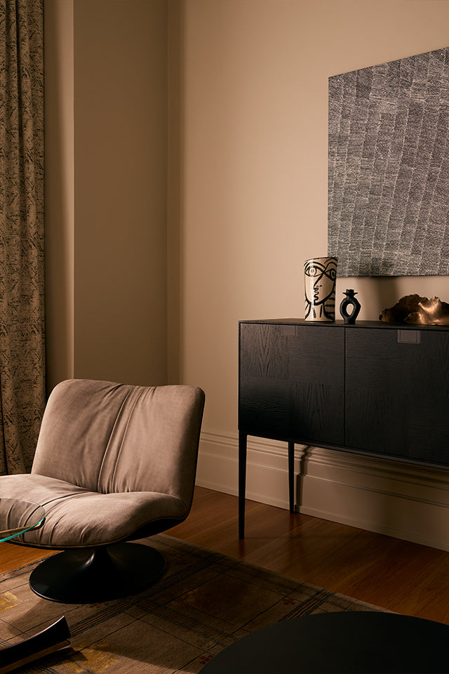 Featuring the Baxter Marilyn Revolving Armchair and Maxalto Alcor Storage Unit.
