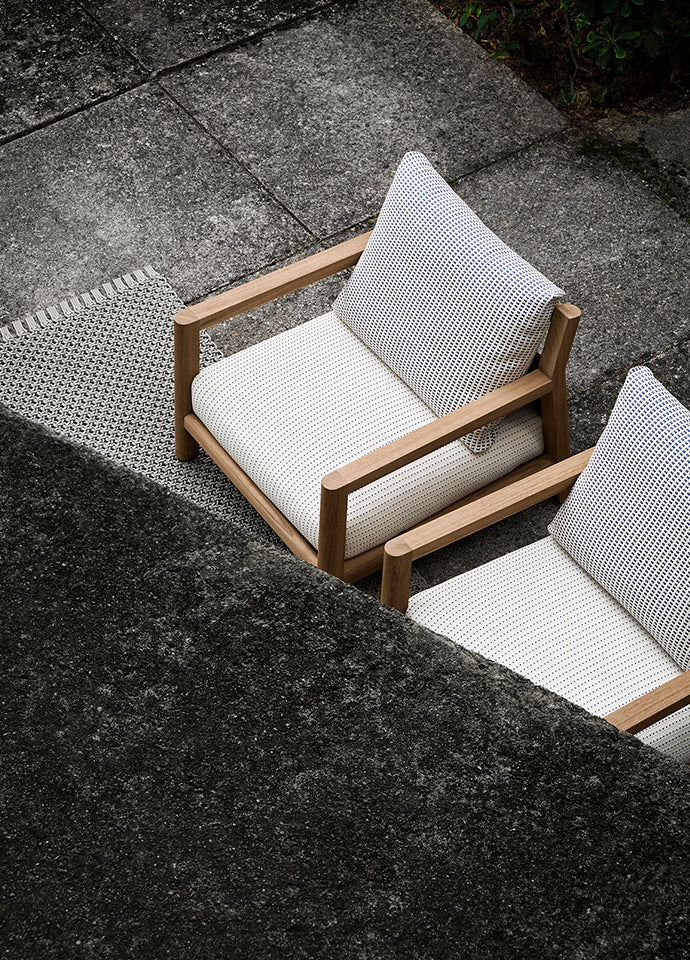 Pablo and its handcrafted timber detailing influenced by traditional Spanish armchairs. Photograph © Tommaso Sartori c/o B&B Italia.
