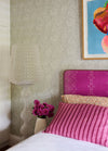 In the bedroom, the owner's original Kartell Kabuki Floor Lamp adds a sculptural layer to the interior. Photo © Prue Ruscoe.

