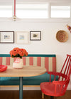 Adding to the owner's love of Kartell, and her original collection, the Kartell Comback Swivel Chair creates another layer of colour play in the dining room. Photo © Prue Ruscoe.

