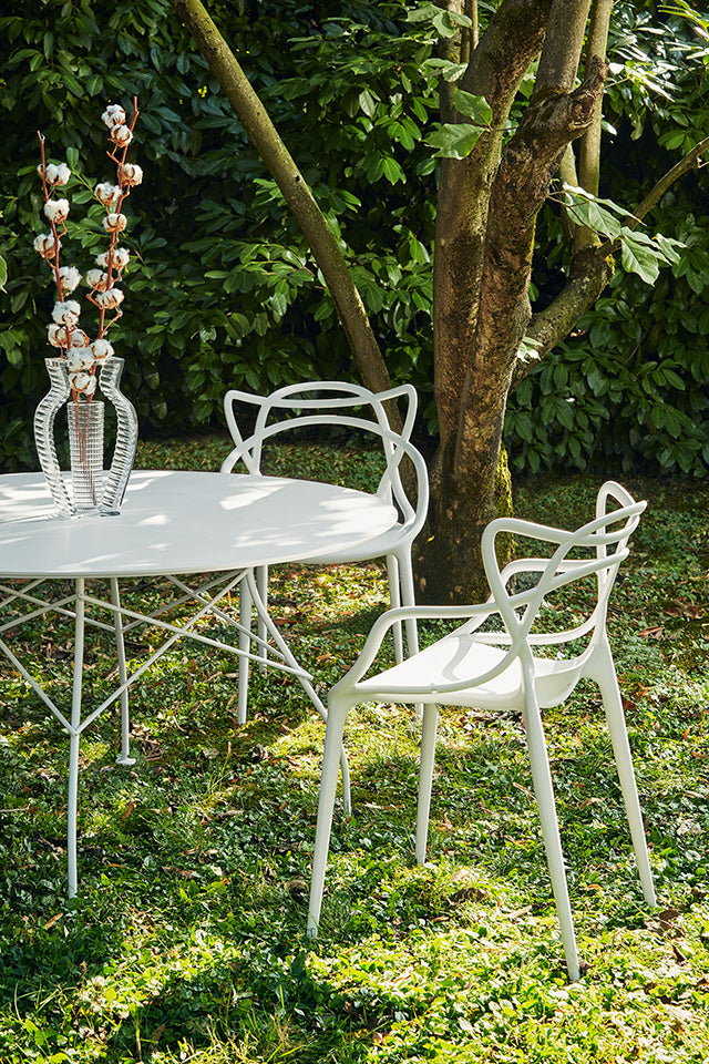 Kartell Masters chair and Glossy table.
