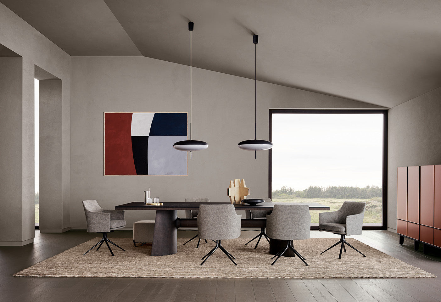 Poliform Kensington dining table and Stanford Bridge chair.
